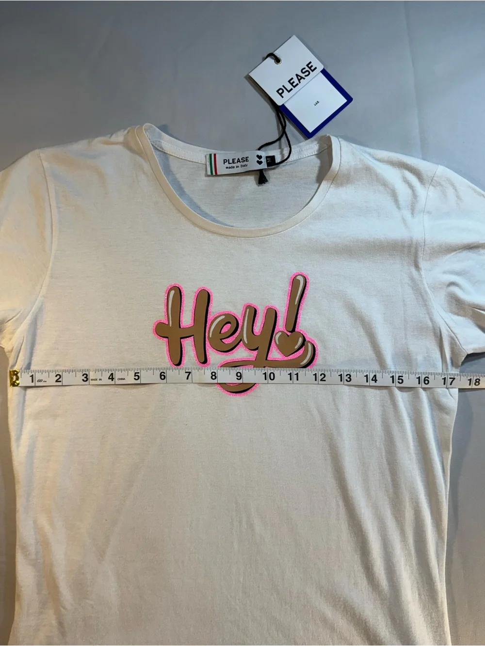Please Women’s Hey!' Graphic T‑Shirt in White with Pink Accent